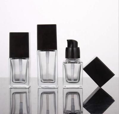 China Cosmetic Liquid Foundation Bottle Square Clear Glass Pump Bottles Cosmetic Cream Dispenser Bottle for sale