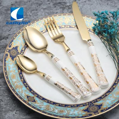 China Sustainable Dinnerware Set Cathylin Luxury Bone China Flatware With Ceramic Handle Gold Flatware Sets For Knife Spoon for sale