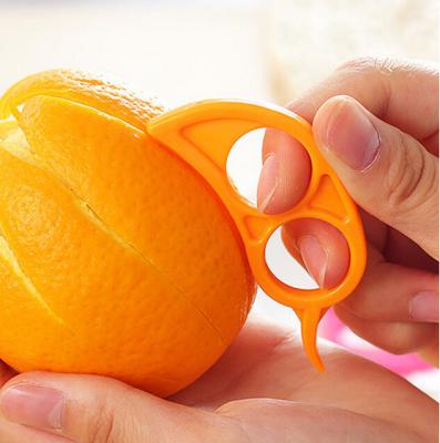 China Small Mini Viable Size Plastic Covers Industrial PP Manual Easy Use Orange Finger Juicer Peeler For Kitchen for sale