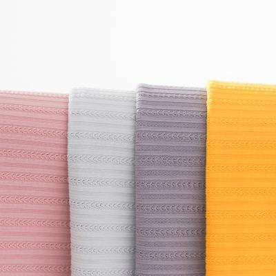 China Soft Hot Selling High Elastic Nylon Spandex Ribbed Weft Knit Fabric For Bikini Gents Women Underwear for sale