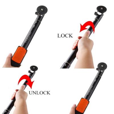 China Retractable Rotary lock/unlock bluetooth mobile phone monopod selfie stick for sale