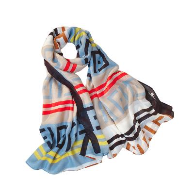 China Simple Polyester Temperament Sunscreen Women Letter Circle Pattern With Cotton Muslim Printing Scarf for sale