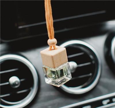 China Luxury Cube Aromatherapy Car 10ml Transparent Glass Bottle In Place Hanging Auto Air Freshener Fragrance Diffuser Pendant Wholesale for sale