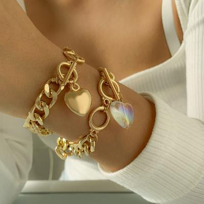 China FASHIONABLE personality set personality peach alloy fashion geometric heart acrylic bracelet for sale