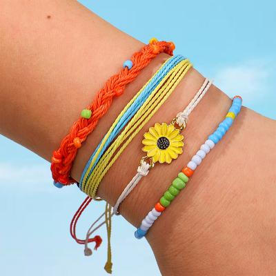 China TRENDY Colorful Wax Thread Braided Bracelet Set Sun Flower Rice Bead Fashion Braided Bracelet For Women for sale