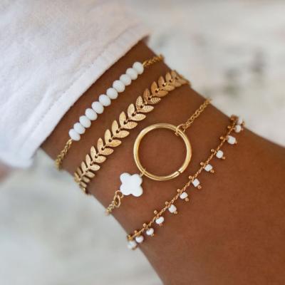 China TRENDY Fashion Beaded Jewelry White Rice Beads Tassel Bracelet Pattern Arrow 4-Piece Set Bracelet Women for sale