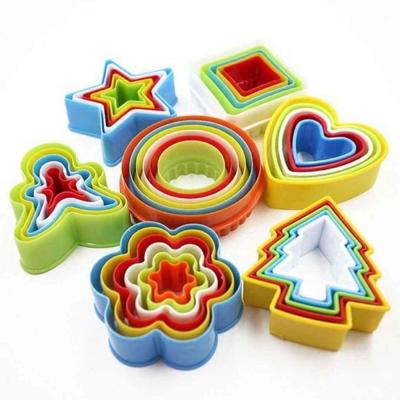 China Sustainable Gingerbread Man Shaped 5Pcs Plastic Cookie Cutter PP Colored Cookie Cutter Set for sale