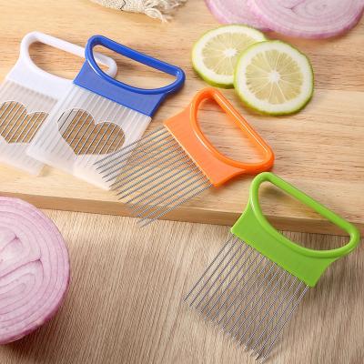 China Hot Selling Tools Onion Rack Food Slicer Vegetable Onion Fork Holder Viable For Slicing Onion Needle for sale