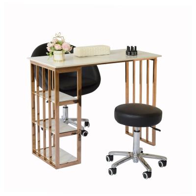 China Nice modern nail station furniture gold color manicure pedicure table and chair set for sale