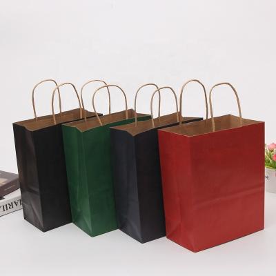 China Wholesales Custom Logo Printed Cheap Recycled Women's Clothing Packaging Paper Bag Recyclable for sale