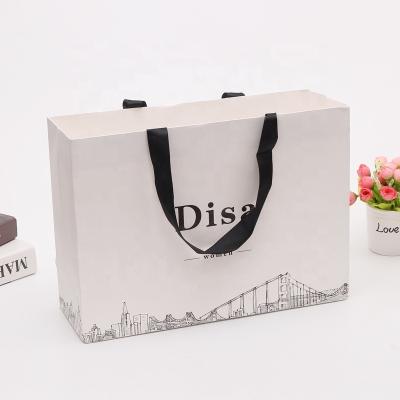 China Factory Supply Bargain Price Recyclable Shopping Paper Bag With Custom Logo for sale