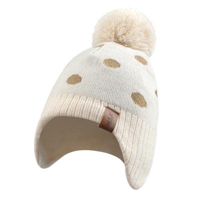 China COMMON Polka Dot Kids Hat Winter 100% Acrylic Polyester Beanie For Boys Girls Knitted Kids Hat With Earflap for sale