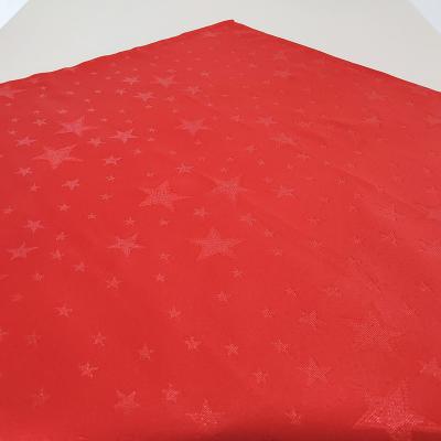 China Waterproof Christmas Jacquard Polyester Table Decoration Fabric with Red Star for Holiday Promotion for sale