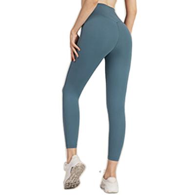 China Breathable High Waist Hip Lifting Naked Yoga Women's Naked Quick Dry Peach Fitness Running Tight Pants for sale