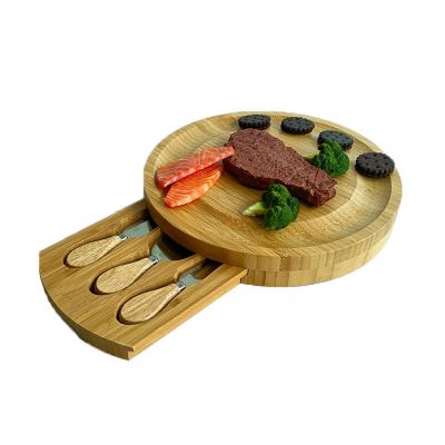 China Bamboo Round Kitchen Cheese Cutting Board Eco - Friendly Sustainable With Cutlery With Slide - Out Drawers for sale