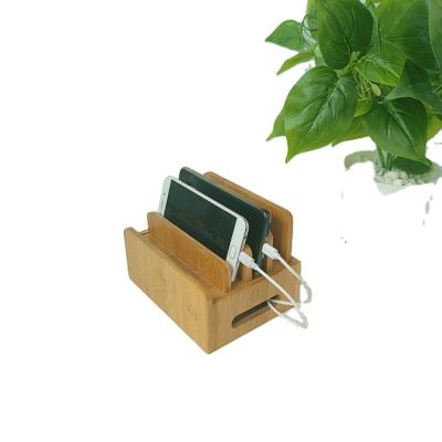 China Sustainable Modern Style Bamboo Wooden Phone Smart Charging Station For Multiple Devices for sale