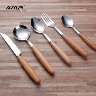 China Disposable Portable Travel Stainless Steel Hotel Flatware Set With Wooden Handle for sale