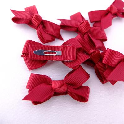 China Lovely Tiny Hair Bows With Covered Snap Clips For Lovely Babies Hair Bow Clips Baby Kids Accessories for sale