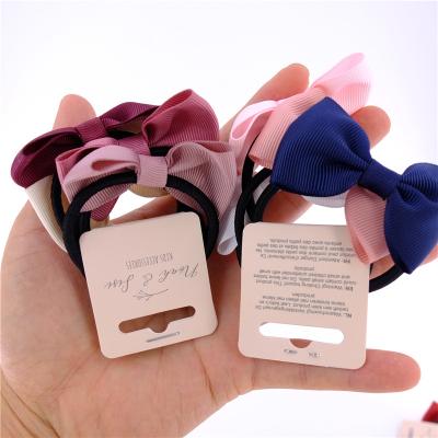 China Fashion Customize Elastic Tag Hair Bow Elastic Bands Accessories Ponytail Holder Hair Bands For Babies Kids OEM ODM for sale