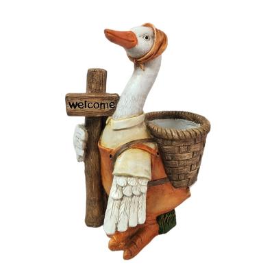 China New Design Cartoon Animal Green Sandstone Duck Shape Flower Pot Polistone Planters Pot For Outdoor Garden Decoration for sale