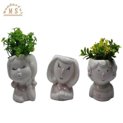 China New Classic/Postmodern OEM Customized Ceramic Human Kids Face Souvenir Succulent Gifts Flower Pot&Planter Home Decor Table Ornament for sale