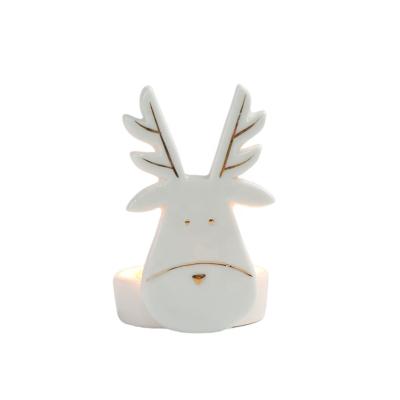 China Home Ceramic Candle Container Reindeer Candle Holder Christmas Decoration Deer Christmas Decoration Candle Desktop Vessels for sale