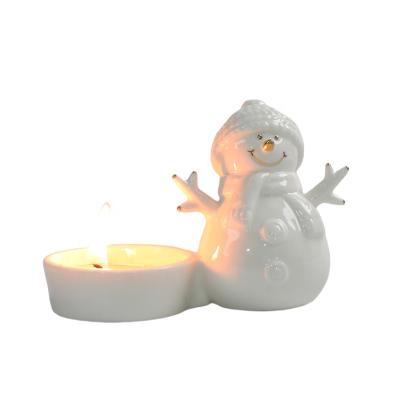 China Home Decoration Snowman Shaped Candle Ships Candle Holder Winter Ornaments Modern Ceramic White Candle Container Table Decoration for sale