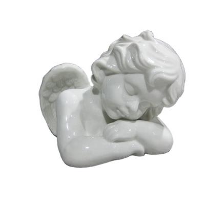 China Europe glazed ceramic angel figurine sleeping angel porcelain figurines, white porcelain angel figurine, ceramic angel figurines for sale