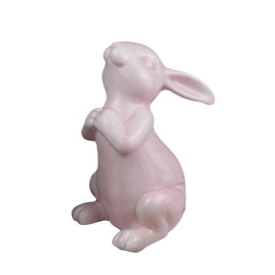 China Eco-friendly Happy Cute Rabbit Chicken Egg Rabbit Easter Ornament Dolomite Porcelain Animal Desktop Figurine for Home Decoration for sale