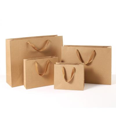 China Portable Kraft Paper Bags Clothing Gift Bags Moisture-proof Various Sizes Horizontal Versions for sale