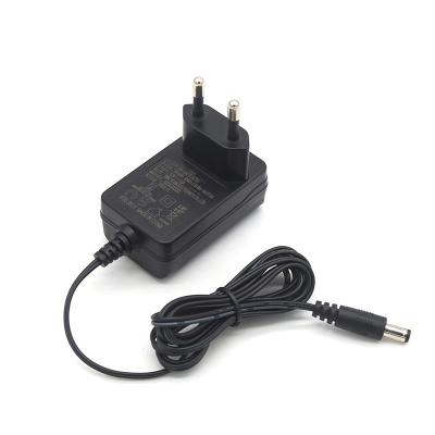 China ABS+PC Factory 2A EU Plug Travel AC Wall Charger 12V 24V 2A 3A Flame Retardant Material Home Power Adapter for sale