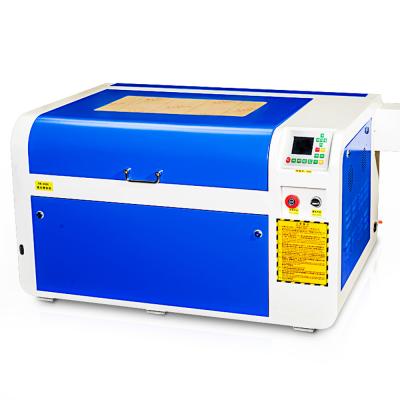 China Mini CNC Laser Engraving Machine 4060 40W/50W Small Portable Water-cooled CO2 Desktop for sale