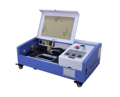 China Laser Engraving 3020 High Quality Laser Marking Small Size Portable Metal CO2 Laser Engraving Machine for sale