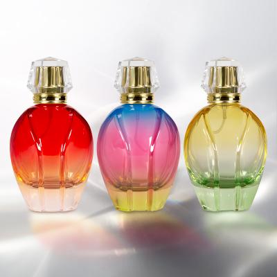 China Modern Design Cosmetic Elegant Three-color High Glass Gradient 100ml Spray Luxury Empty Glass Perfume Bottles for sale