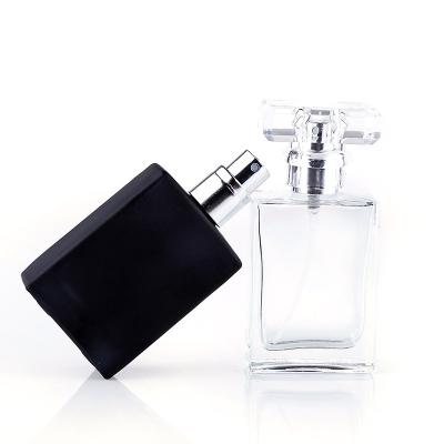 China Cosmetic 30ml 50ml Black White Vintage Spray Refillable Glass Perfume Bottle With Pump Sprayer For Perfume Packaging for sale