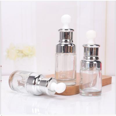 China Cosmetic Custom Design High End 30ml Essential Oil Serum Round Glass Dropper Bottle Packaging With Box for sale