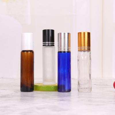 China Wholesale Cosmetic Empty Roll Bottles Clear Amber Blue Glass Roll On Bottle 10ml With Essential Oils for sale