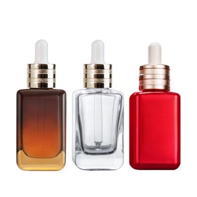 China Glass Bottle 50ml Amber Essential Oil Dropper Bottle Empty Cosmetic Skin Care Packaging Bottle for sale