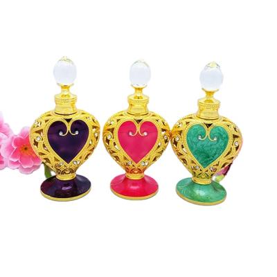 China Fancy Personal Care Heart Shape Essential Oil Bottle Metal Glass Attar Bottle Perfume Bottle Oil Arabic Aroma Dropper Container Personal Care for sale