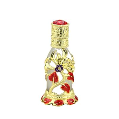 China Personal Care Hot Sale Fancy Design Arabic Dubai Style Metal Essential Oil Glass Bottle for sale