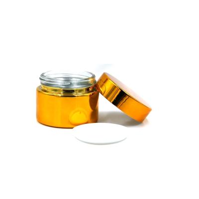 China Personal Care Beauty Cosmetic Cream Jar Gold Glass Jelly Container 50g for sale