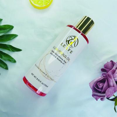 China Natural Organic Lighting Rose Fragrance Face and Body Skin Revitalizer Whitening Shimmer Massager Oil Serum for sale