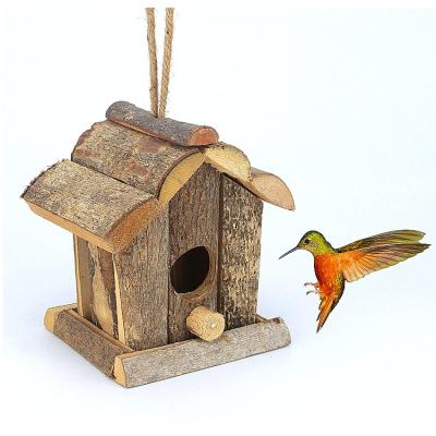 China Best Selling Handcrafted Sustainable Outdoor Natural Wood Modern Fashion Pine Bird Hanging House for sale