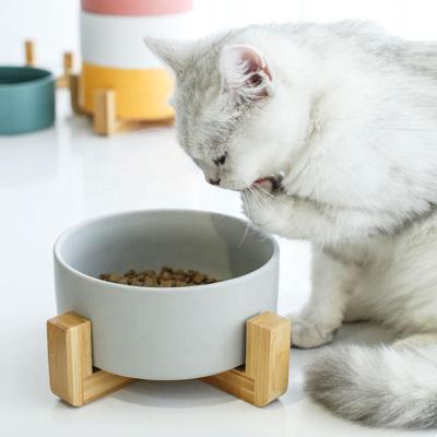 China Hot Selling Automatic Pet Water Food Feeder Cat Dog Bowl With Wooden Multi Colored Ceramic Frame for sale