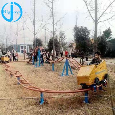 China fiberglass and steel outdoor playground power equipment human roller coaster for sale, cheap roller coaster mini ride for sale