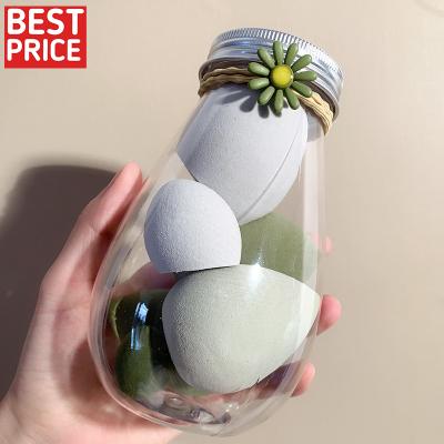 China 6pcs base boxed cosmetic plastic sponge eggs sunflower accessories bottle mass wholesale for sale