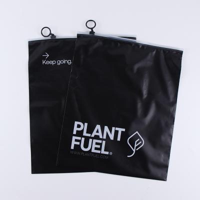 China Recyclable Pla CPE Black Plastic Packaging Bag Compostable Cornstarch Zipper for sale