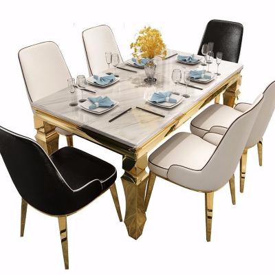 China Factory direct sales modern light luxury combination of dining table and chairs Nordic wind rectangular marble dining table for sale