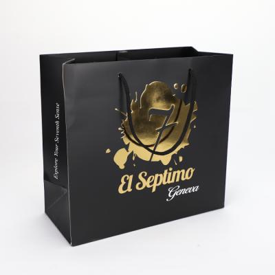 China Custom Black Gold Foiled Stamping Kraft Logo Hot Foiled Paper Bag Recyclable With Cotton Rope Handles for sale