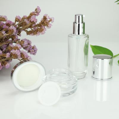 China 100ml 40ml Glass Eco-friendly Custom Clear Cosmetic Bottles 50g 30g Empty Cosmetic Cream Container for sale